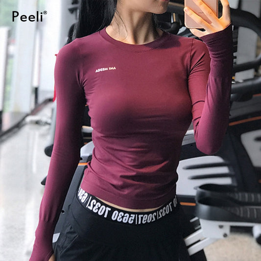 Women's Nylon Spandex Long Sleeve Shirt w/ Thumb Hole Cuts